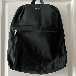 Tumi Black Backpack with Gold Accents
